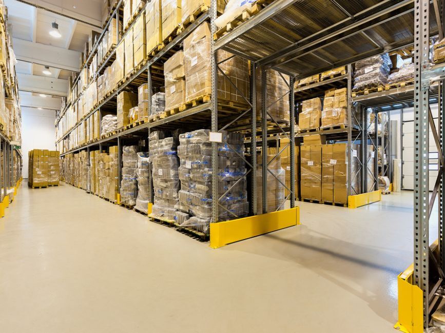 Interior-of-a-huge-spacious-warehouse-with-carton-boxes